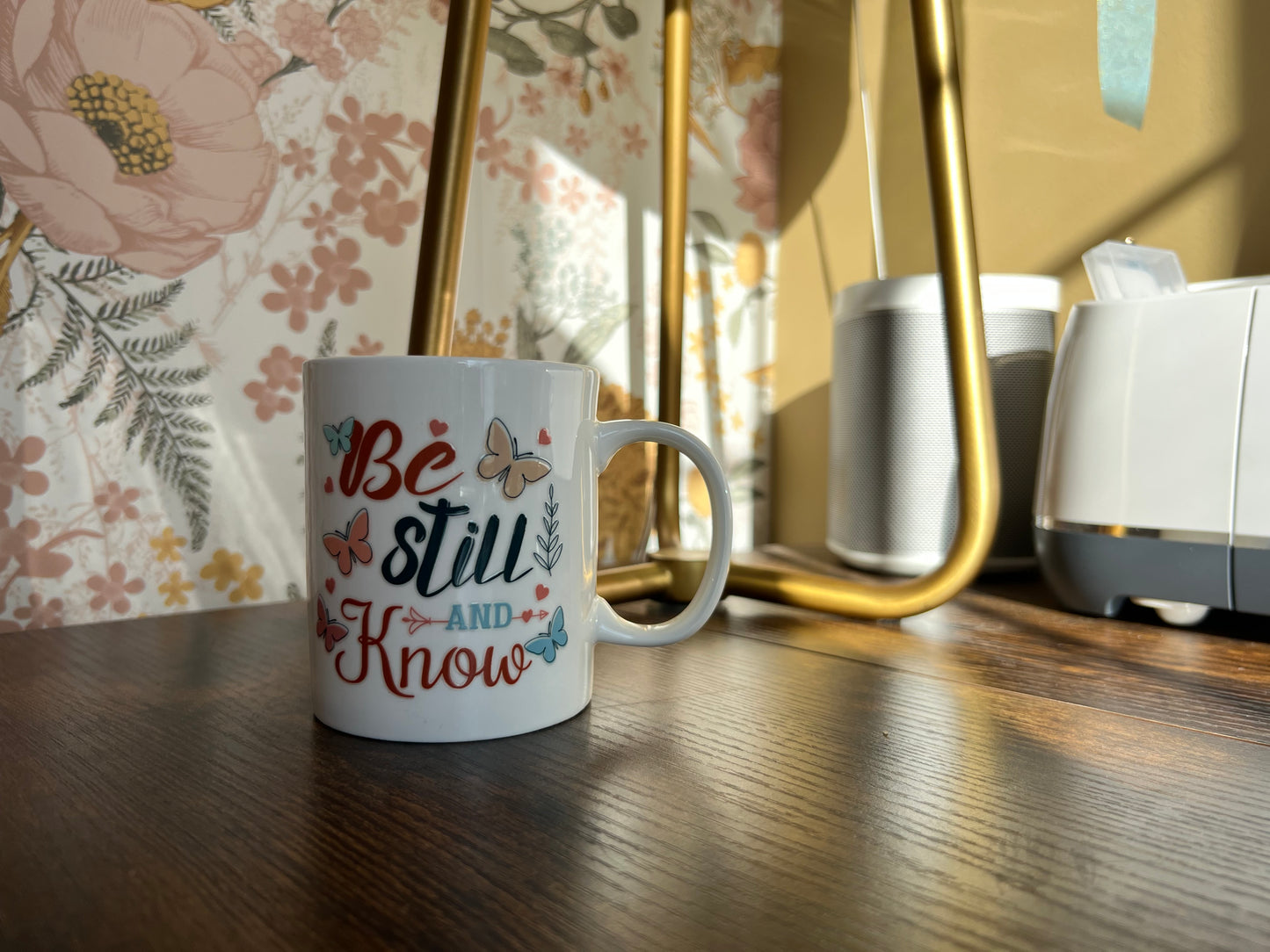 Glassware mug featuring inspirational faith saying from Sons & Daughters, with a printed design on a clear glass mug.