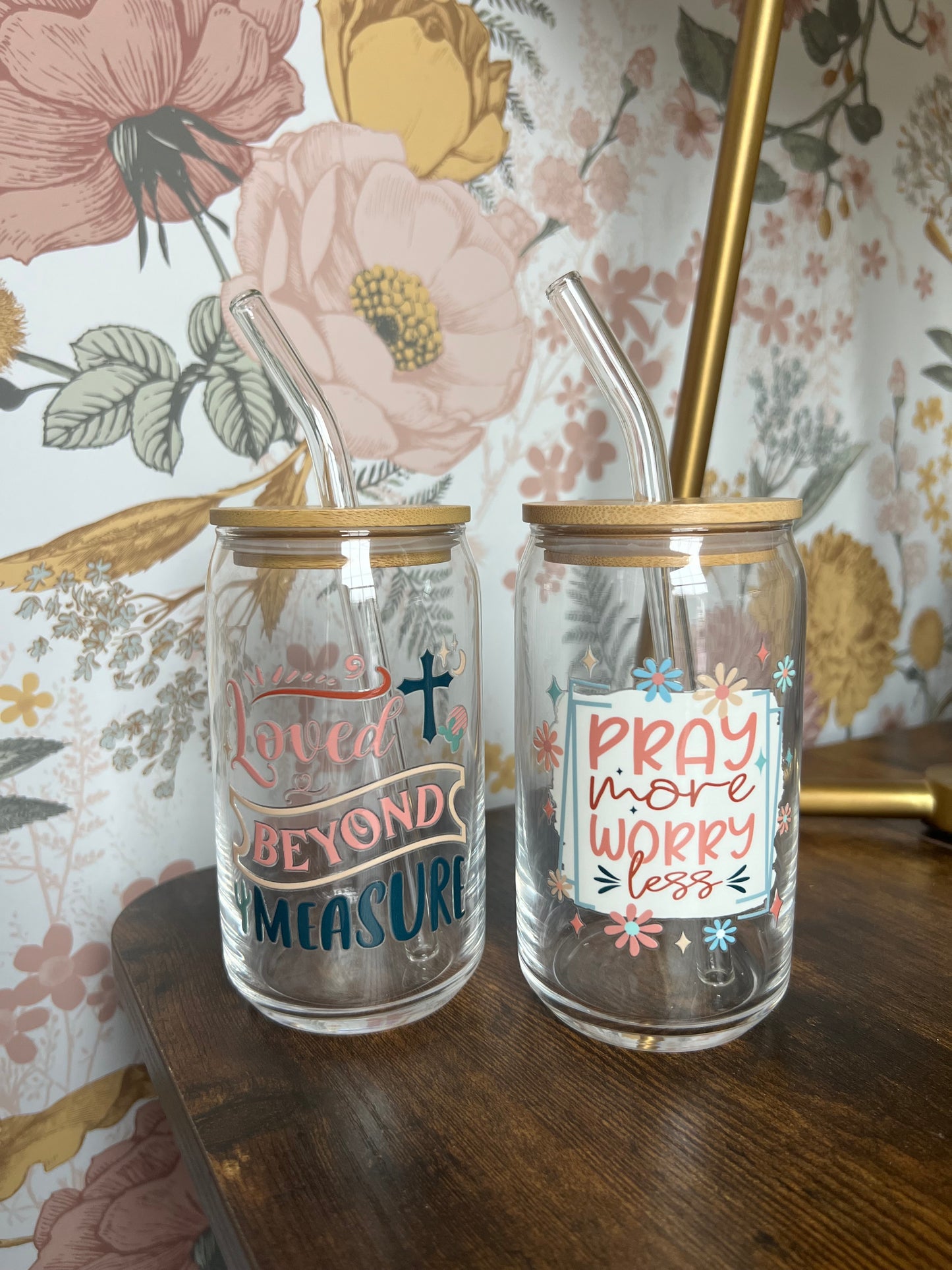 Sons & Daughters glassware can with motivational "Truth and Encouragement" label, featuring clear glass and printed design.