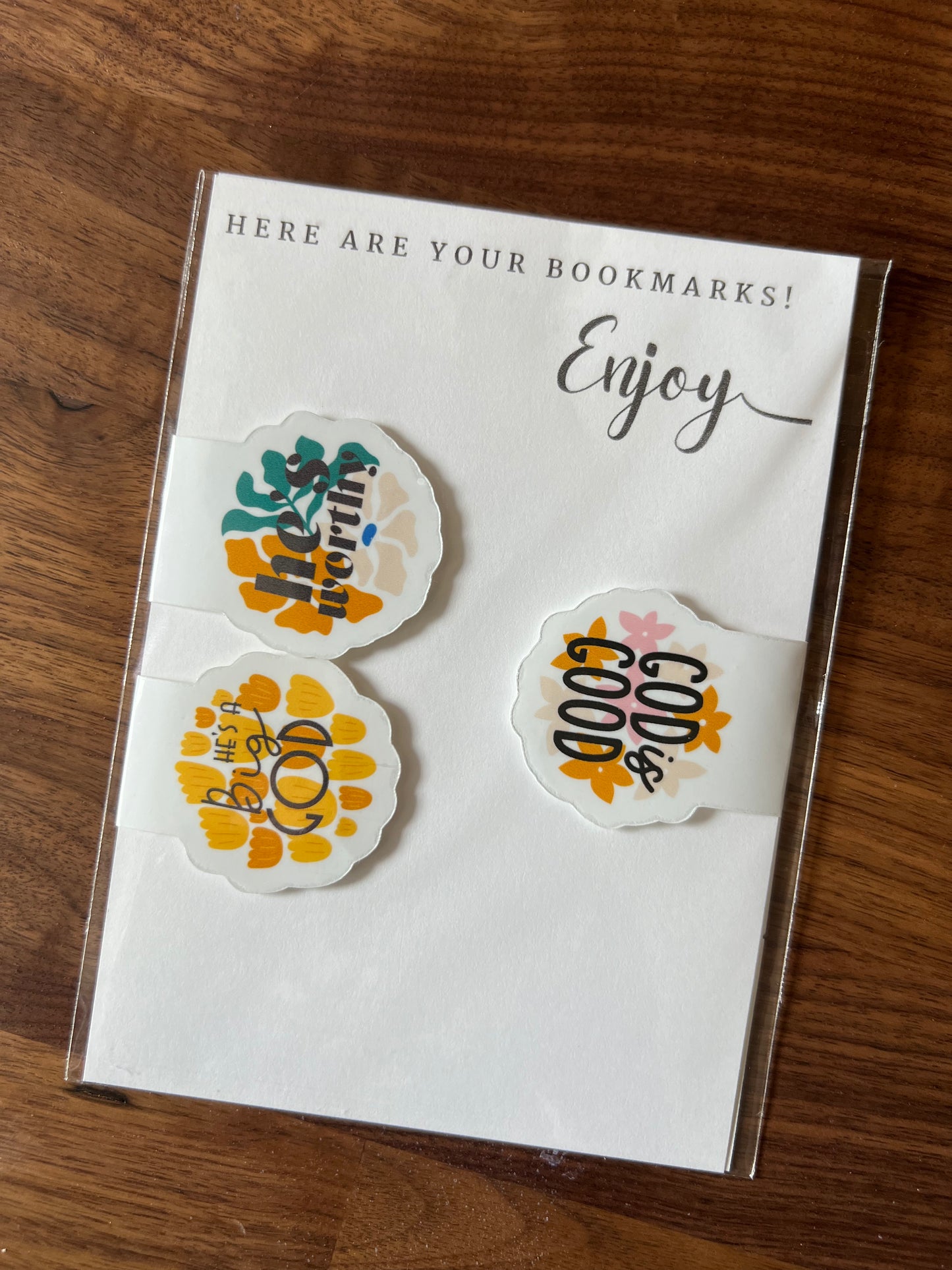 Set of three Sons & Daughters HE magnetic bookmarks featuring colorful, decorative designs on metal clips for marking pages.