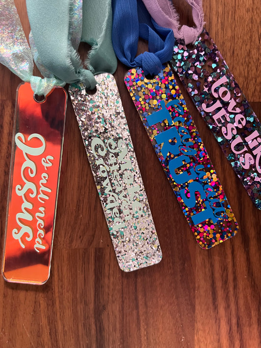 Sons & Daughters glittering acrylic bookmark with shimmering design, perfect as a gift for book lovers.