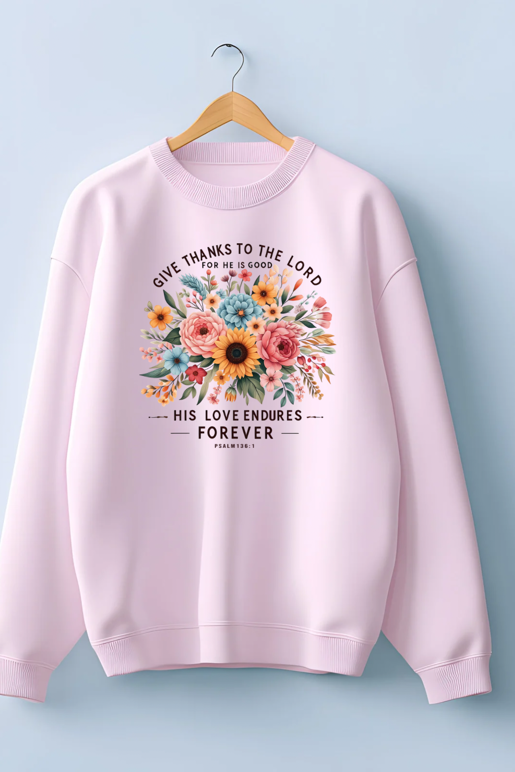 Sons & Daughters His Love Endures Forever sweatshirt shown in a close-up image, featuring white text on a dark fabric background.