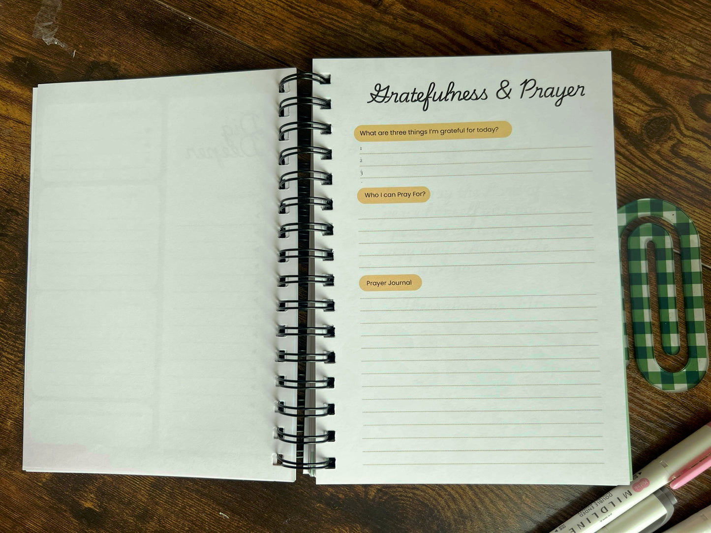 Spiral-bound Growing Till Glory “Fruit of the Spirit” journal by Sons & Daughters with colorful cover and inspiring design.