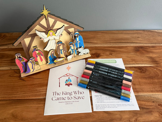 DIY wooden nativity craft kit by Sons & Daughters, featuring painted figures for Christian Christmas family activity.