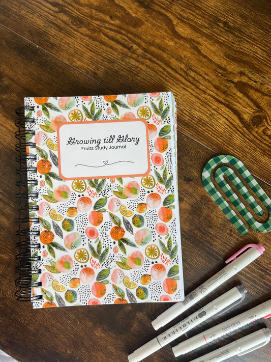 Sons & Daughters Growing Till Glory “Fruit of the Spirit” spiral-bound journal with floral cover design.