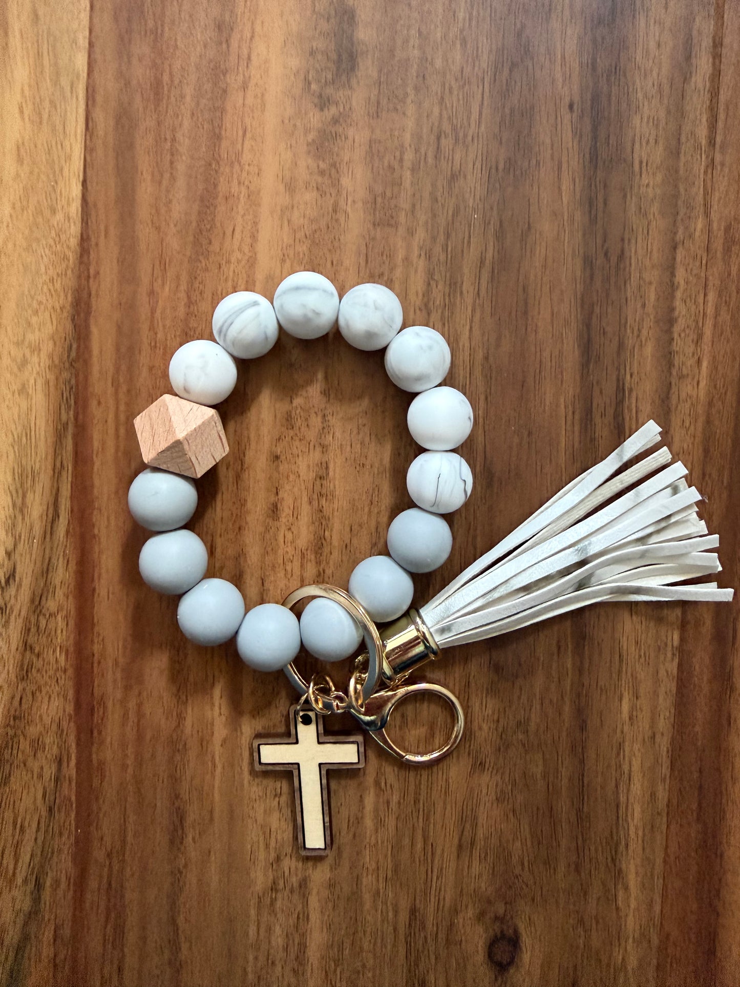 Silicone Cross bracelet keychain from Sons & Daughters accessories, featuring a colorful cross design and durable silicone material.