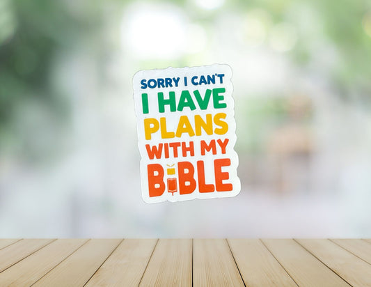 Sons & Daughters "Sorry I can't, I have plans with my Bible" humorous quote T-shirt, featuring white text on a black fabric background.