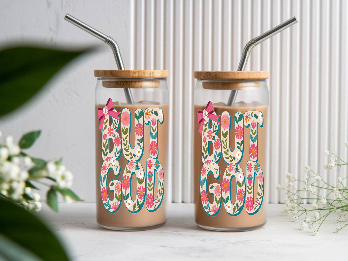 16 oz glass tumbler with floral "God" design, bamboo lid, and reusable straw by Sons & Daughters.