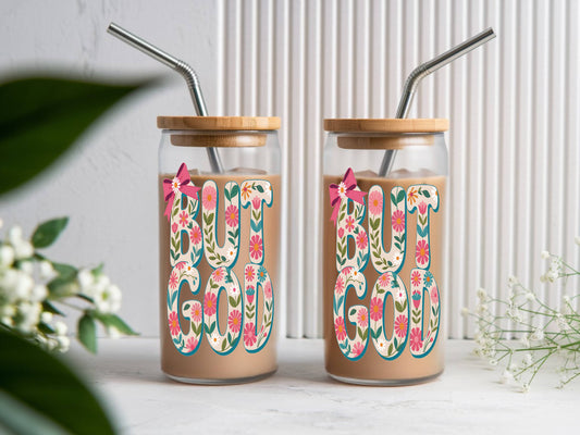 16 oz glass tumbler with floral "God" design, bamboo lid, and reusable straw by Sons & Daughters.