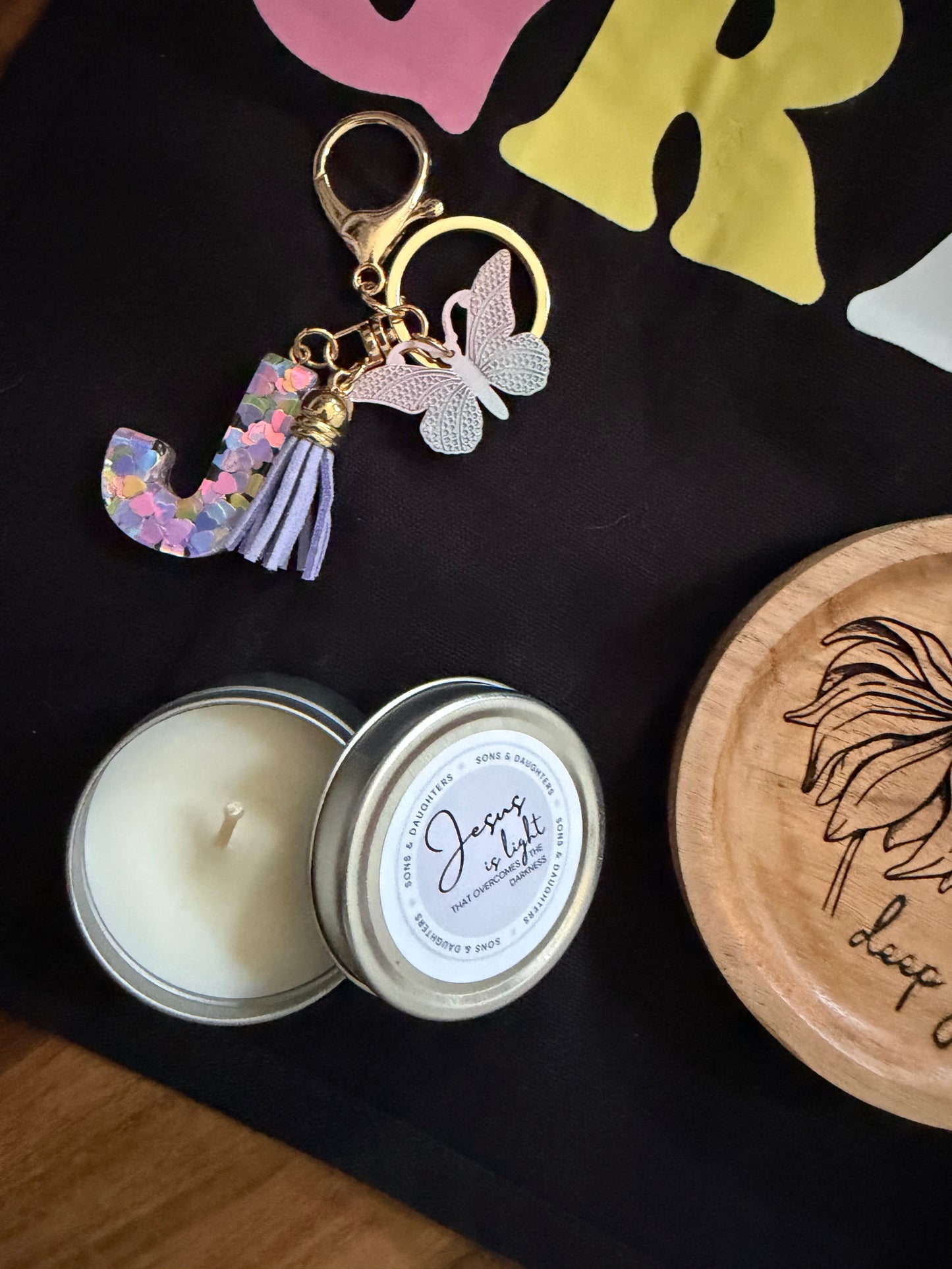 Mystery gift box with Grace theme by Sons & Daughters, includes spiritual soul care kit, t-shirt, and bag, featuring uplifting design.