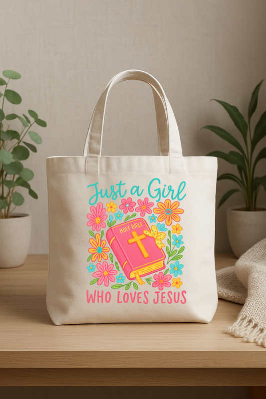 Canvas bag with "This girl loves Jesus" printed slogan, featuring Sons & Daughters branding and a practical carry design.
