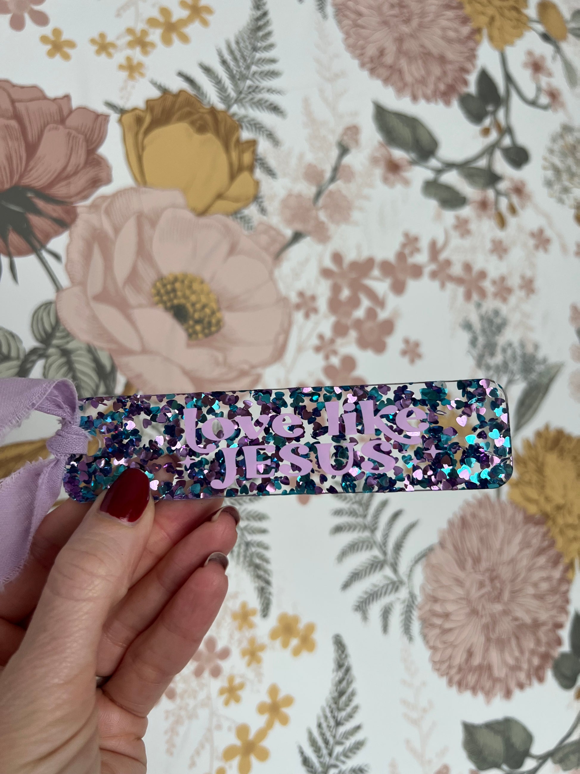 Sons & Daughters Glittering Truth acrylic bookmark with shimmering design, perfect as a gift for book lovers.