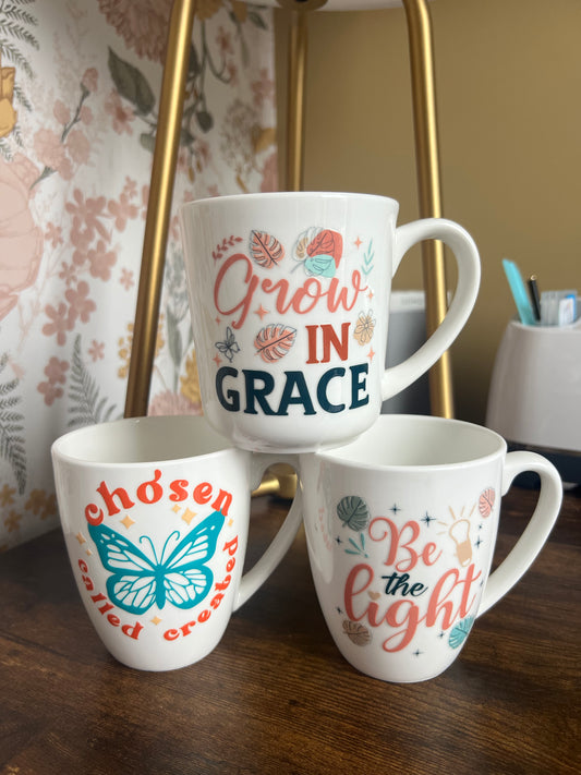 White mugs and glass cans from Sons & Daughters, displayed together in a cozy kitchen setting.