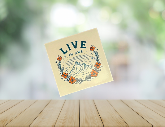 Inspirational "Live In Awe" wall art print with bold typography on a white background, perfect for home decor.