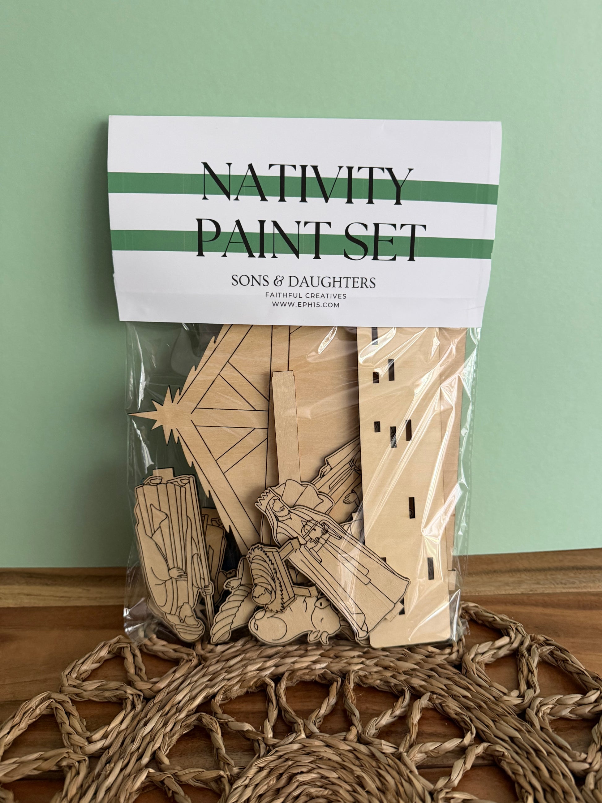 DIY Wooden Nativity craft kit from Sons & Daughters, featuring painted nativity scene pieces for Christian Christmas family activities.