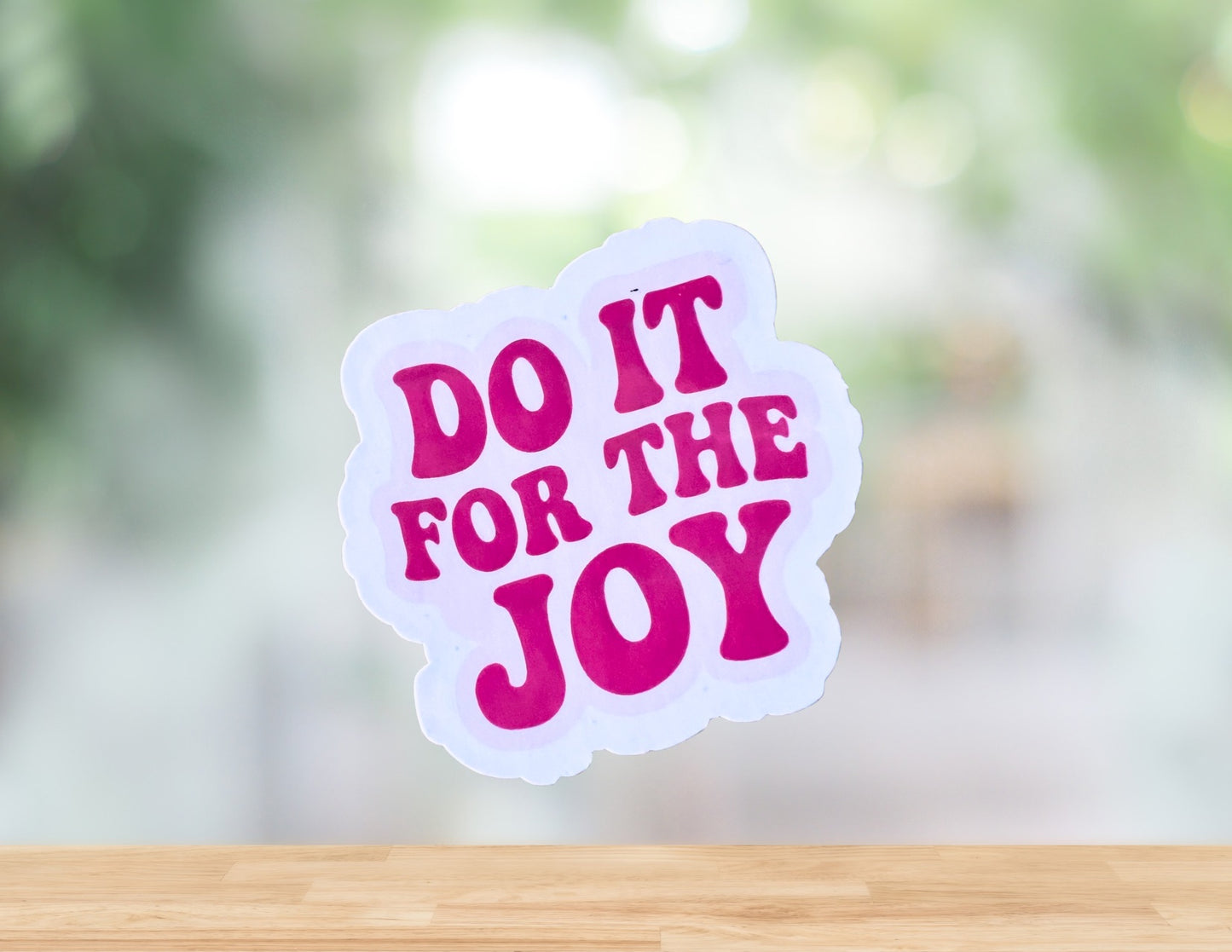 Sons & Daughters "Do It for the Joy" printed fabric in vibrant colors, showcasing the design and texture of the textile.