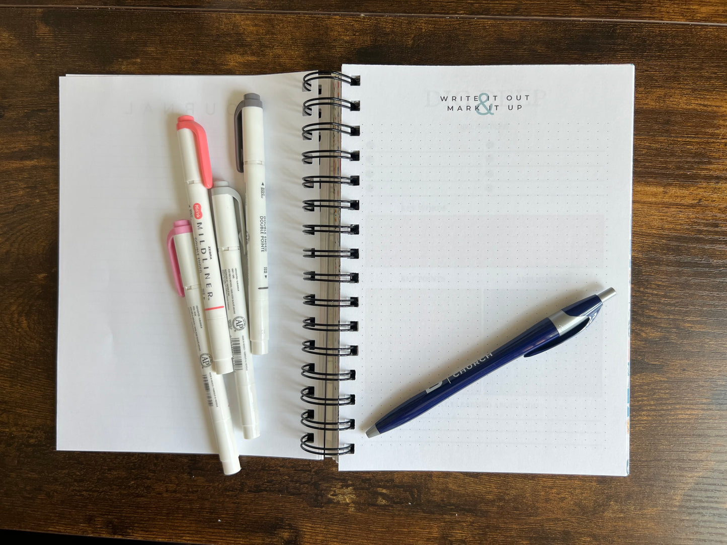 Spiral edition Bible study journal titled "Promises of God" by Sons & Daughters, featuring lined pages for notes and reflections.