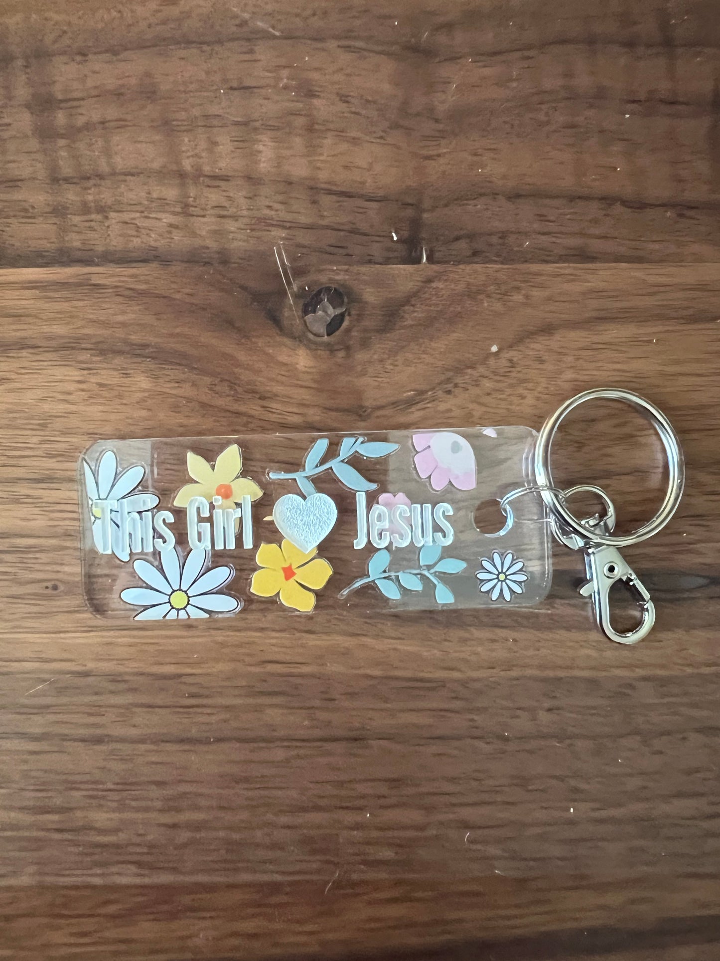 Sons & Daughters Kingdom keychain and bag tag featuring a detailed crown design on a metal tag.