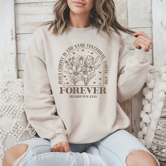Sons & Daughters Jesus is the Same Forever sweatshirt with a printed design, soft fabric, and classic crewneck style.