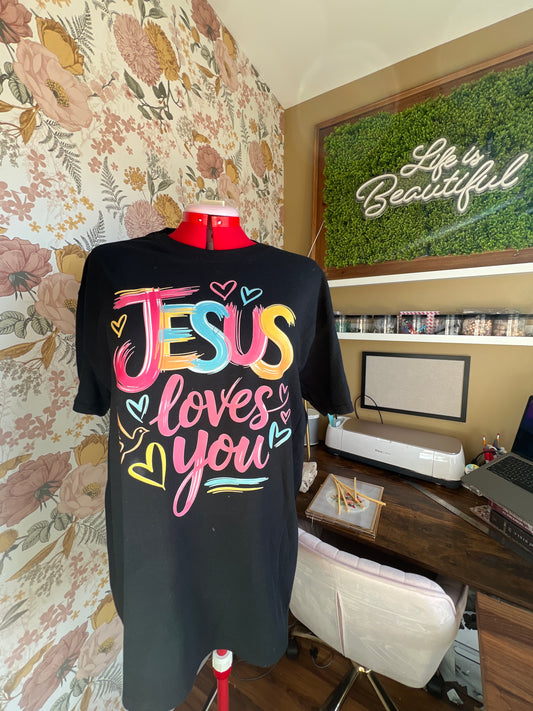 Unisex Christian T-shirt by Sons & Daughters with "Jesus Loves You" printed in bold on a faith-based love tee.