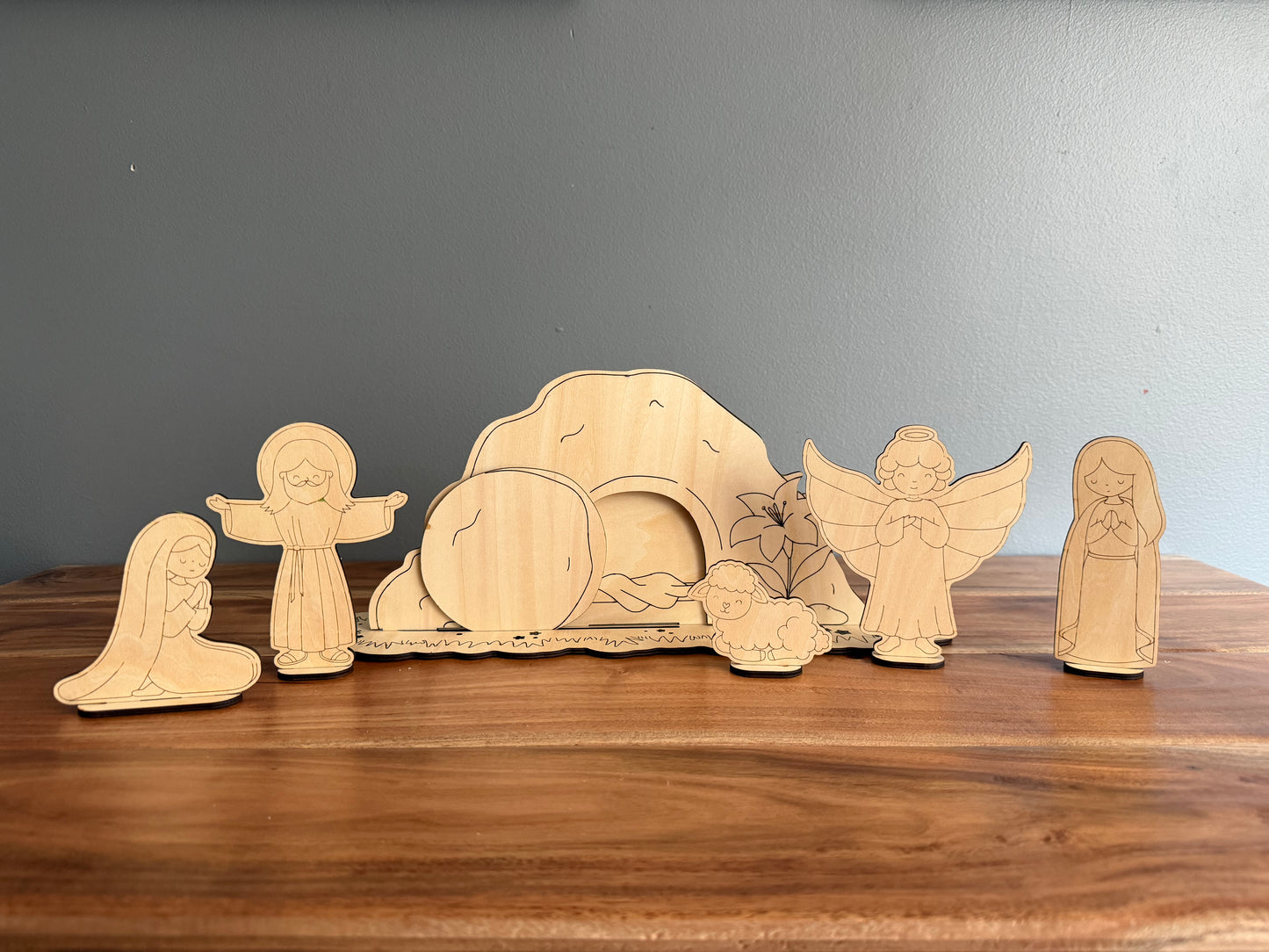 Wooden DIY Resurrection Tomb craft kit by Sons & Daughters, featuring an empty tomb scene for Christian Easter activities for kids.
