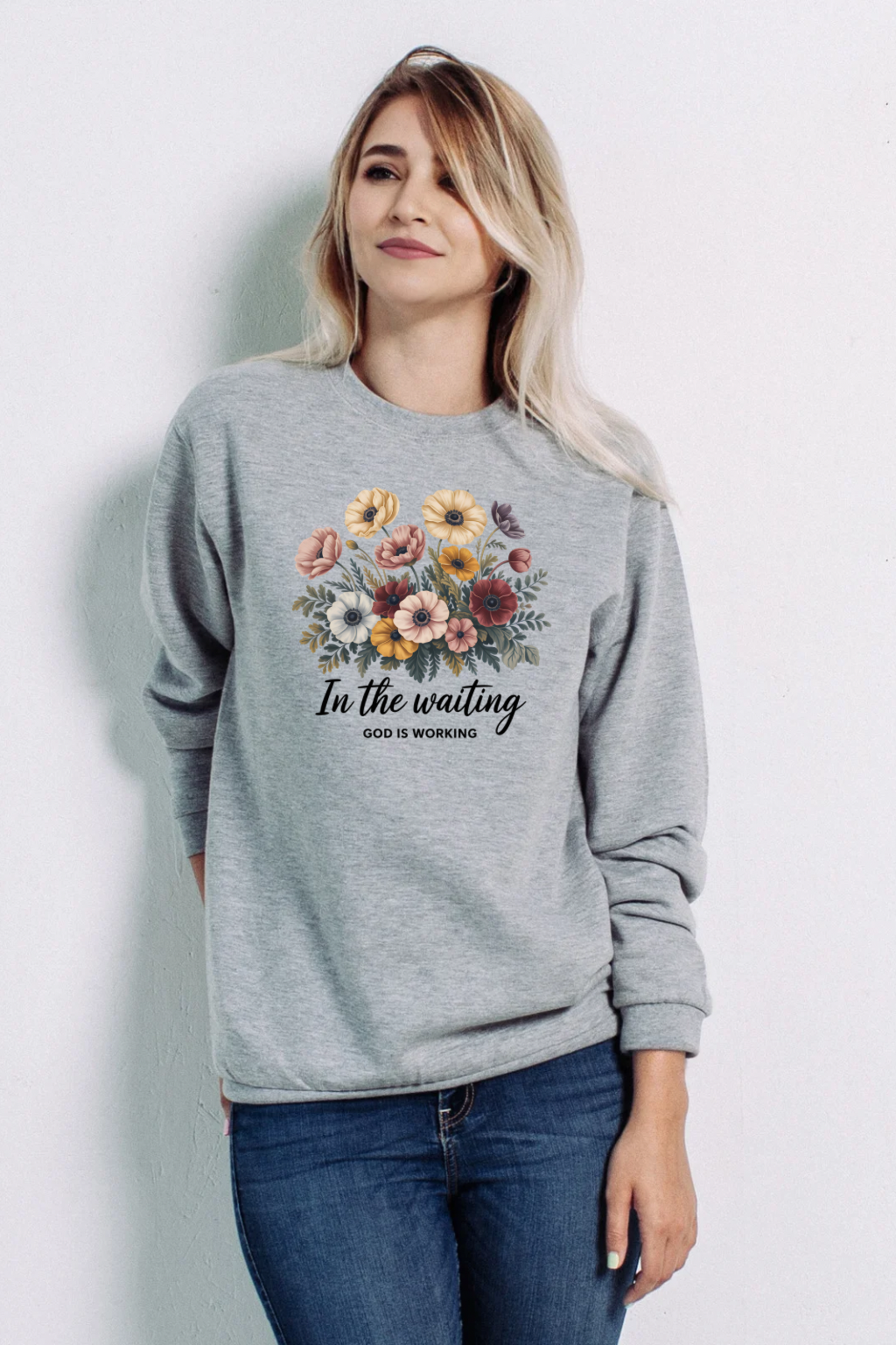 Sons & Daughters In the Waiting sweatshirt in soft fabric with a relaxed fit, displayed on a hanger against a neutral background.