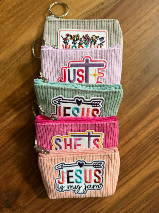 Colorful corduroy coin purse with Christian patch from Sons & Daughters accessories collection, featuring vibrant fabric and detailed embroidery.