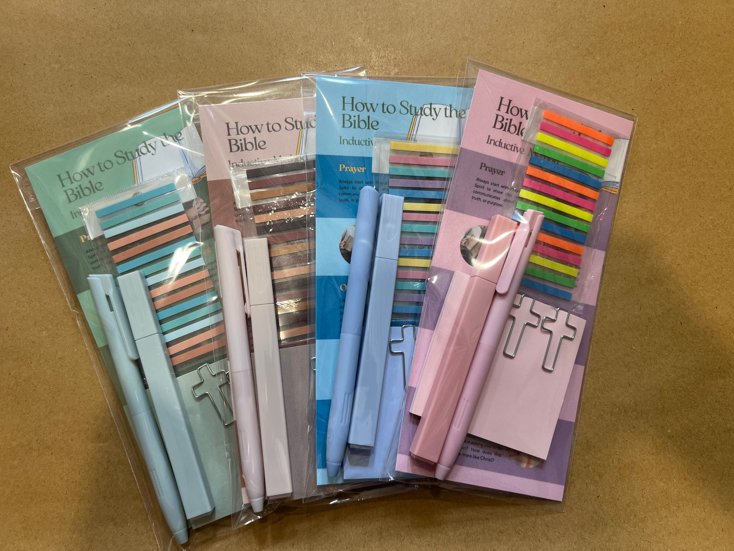 Sons & Daughters inductive Bible study kit with stationery including notebooks, pens, and study guides for in-depth Bible learning.