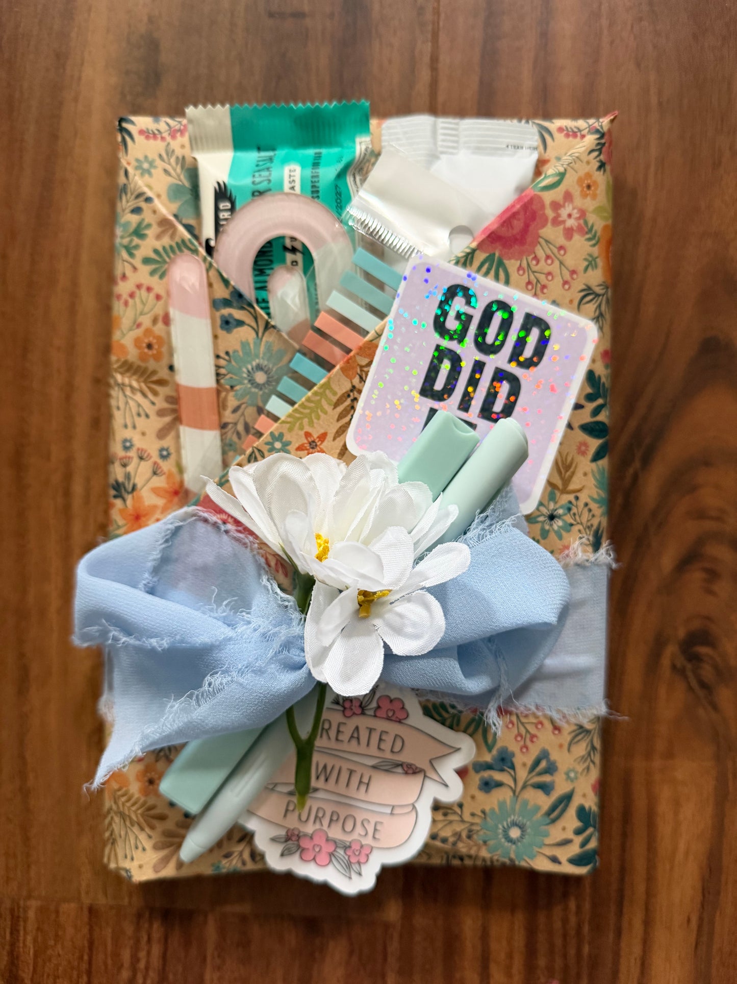 Surprise book titled "Blind Date with Jesus Devotional" by Sons & Daughters, showing the wrapped cover with glimpses of the title.