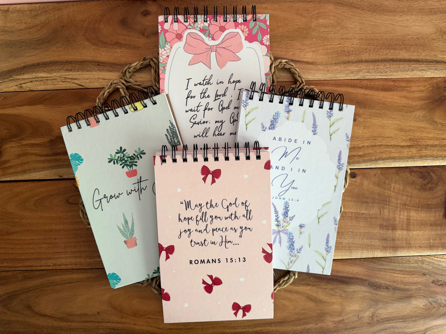 Spiral Christian prayer journal for women by Sons & Daughters featuring devotional pages for sermon notes, Bible study, and reflection.