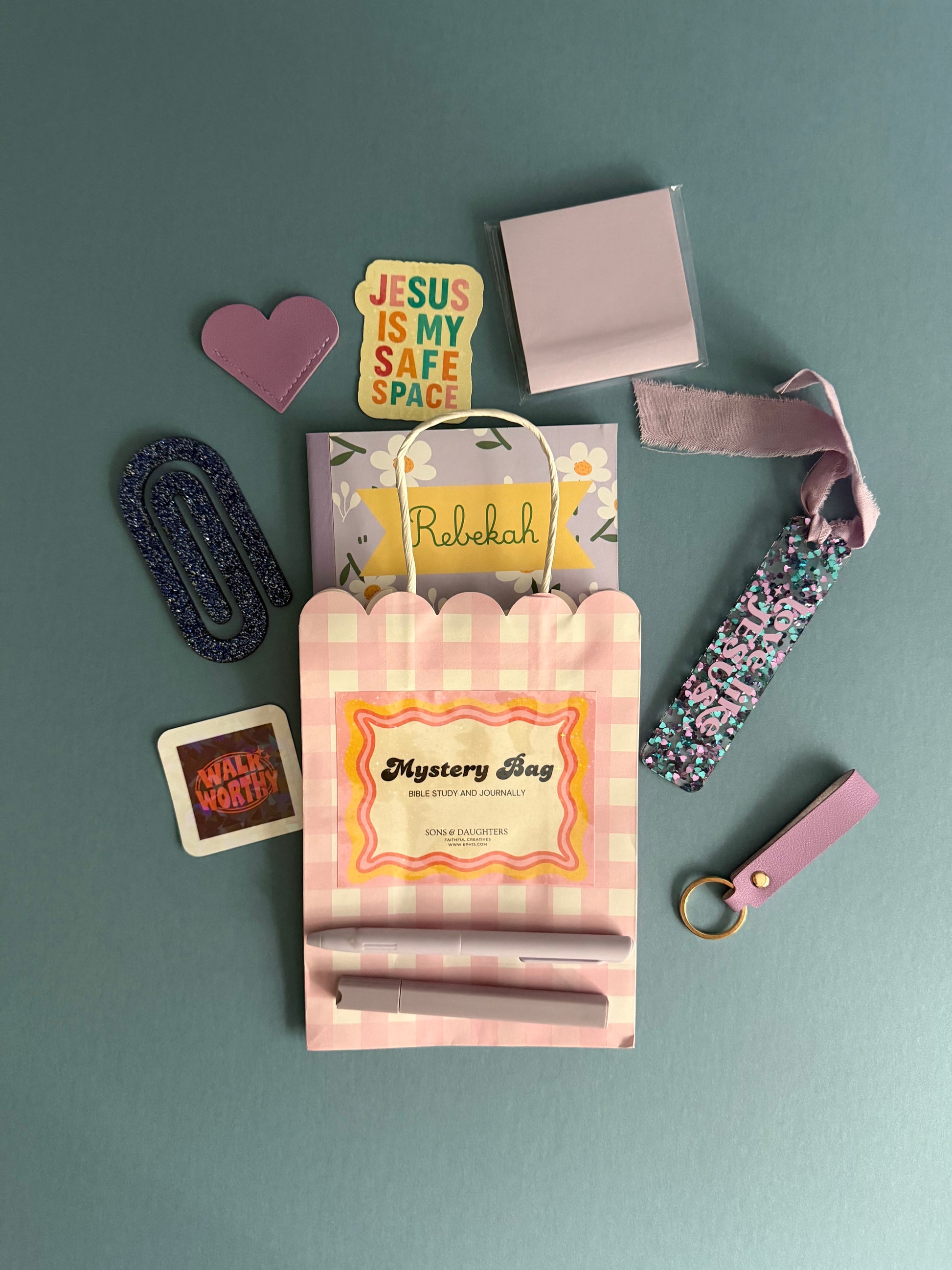 Personalized journaling and study kit by Sons & Daughters with custom notebook, pens, sticky notes, and inspiring Bible verses.
