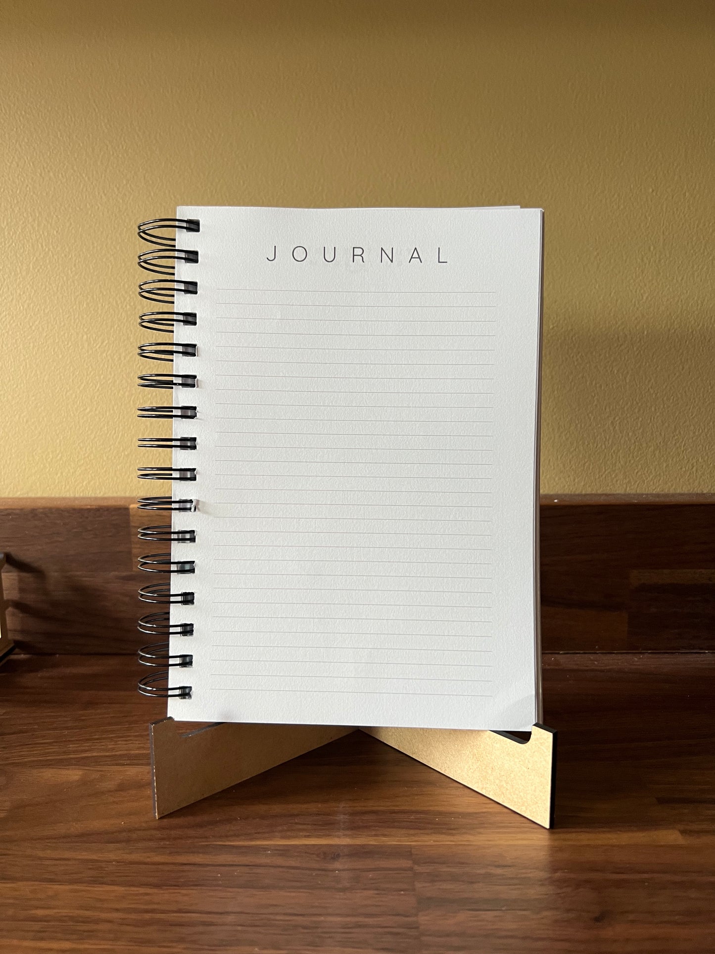 Blue Sons & Daughters Promises of God Bible Study Journal with spiral binding, featuring religious-themed cover design.