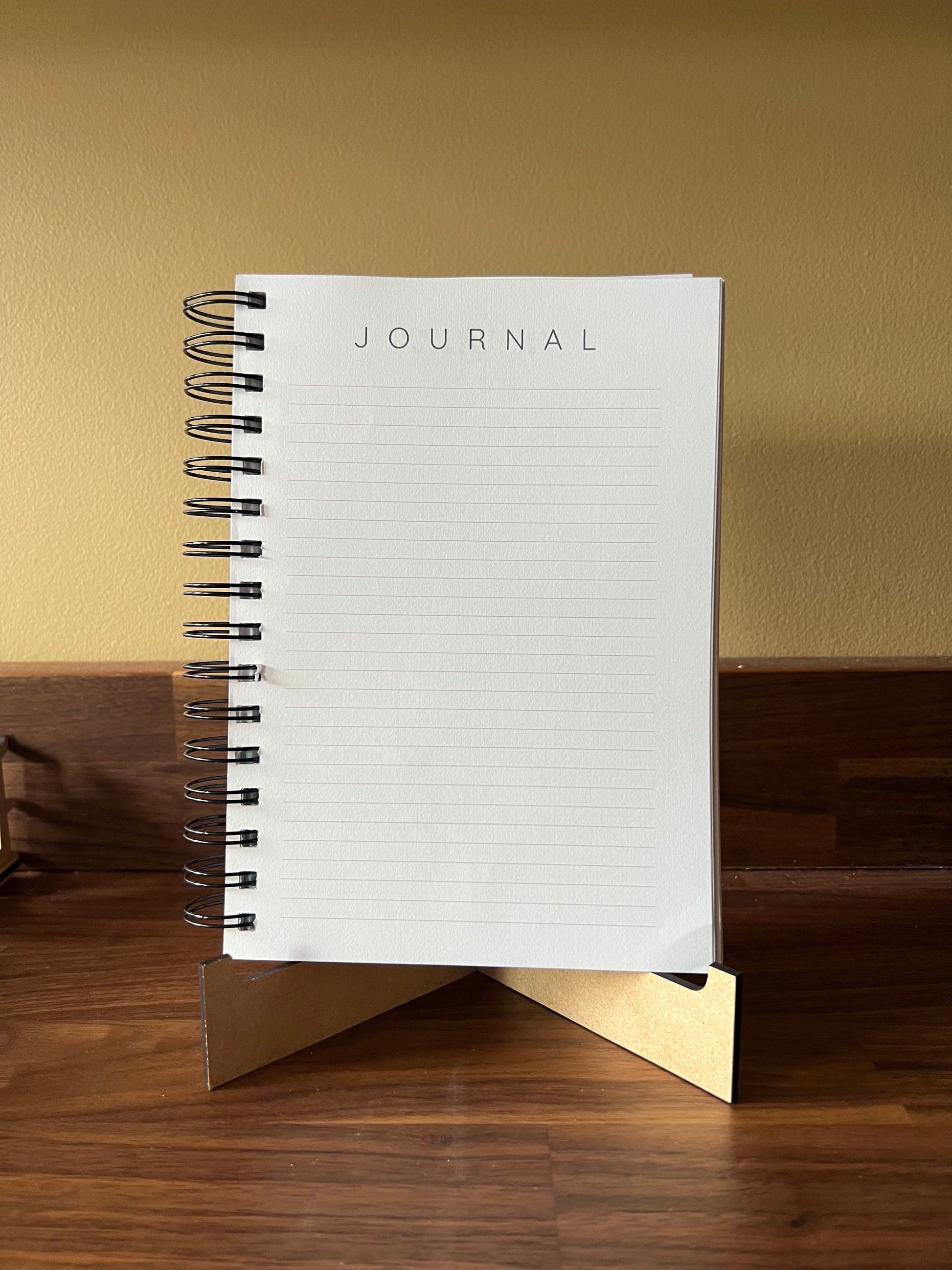Blue Sons & Daughters Promises of God Bible Study Journal with spiral binding, featuring religious-themed cover design.