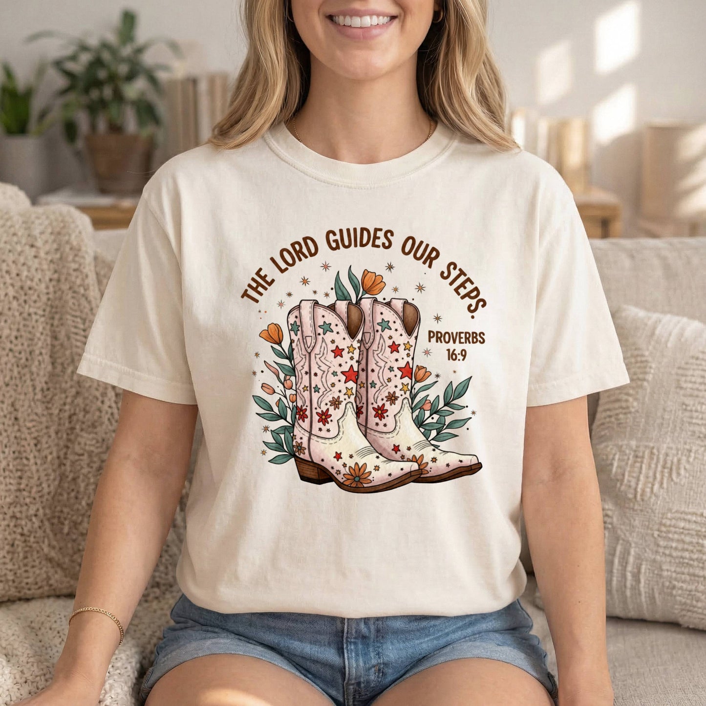 Comfort Colors cowgirl T-shirt with Proverbs 16:9 Bible verse and cowgirl boots graphic, inspirational religious tee for women.