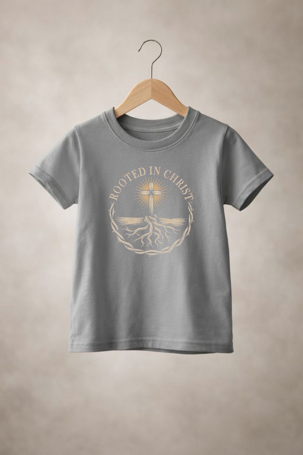 Unisex youth "Rooted in Christ" T-shirt by Sons & Daughters featuring a colorful Christian-themed graphic on a white fabric