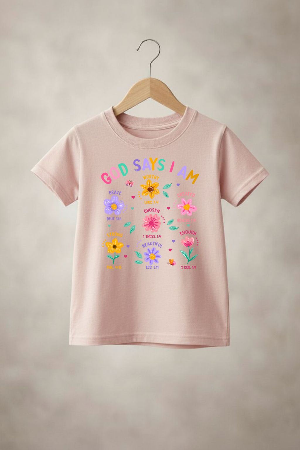 Girls' "God Says" t-shirt by Sons & Daughters, featuring a soft fabric and printed design with inspiring text on a white background.
