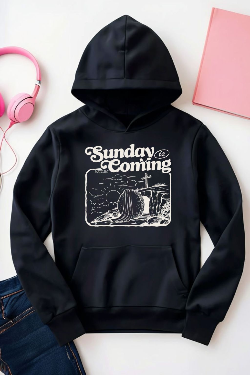 Sons & Daughters Sunday's Coming Hoodie in black, featuring a front print with religious message and comfortable casual fit.