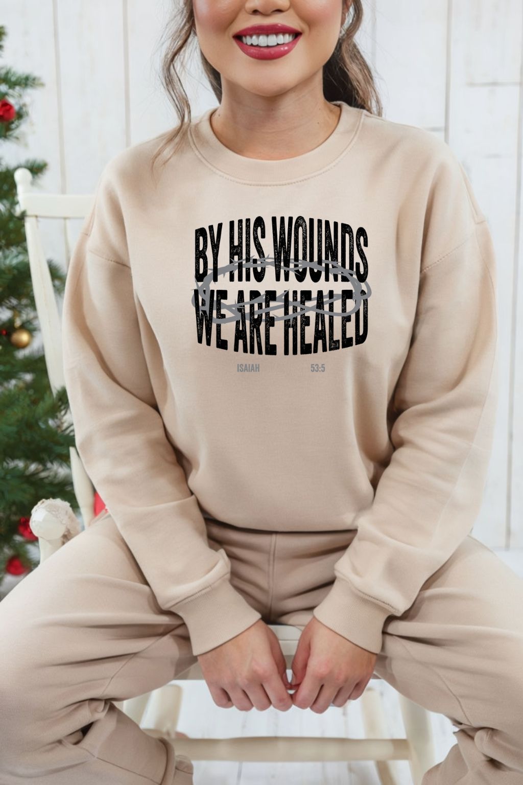 Sons & Daughters By His Wounds sweatshirt featuring biblical-inspired design, soft fabric, and comfortable fit.
