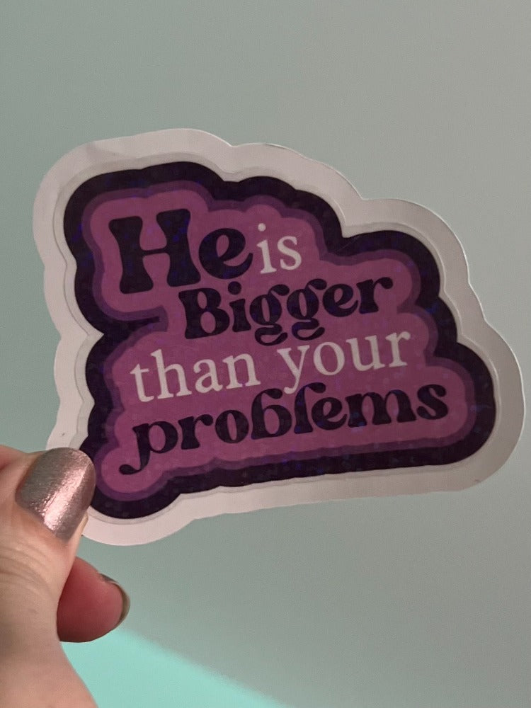 Illustration of a humorous poster titled "He is bigger than your problems" featuring bold text and vibrant colors.