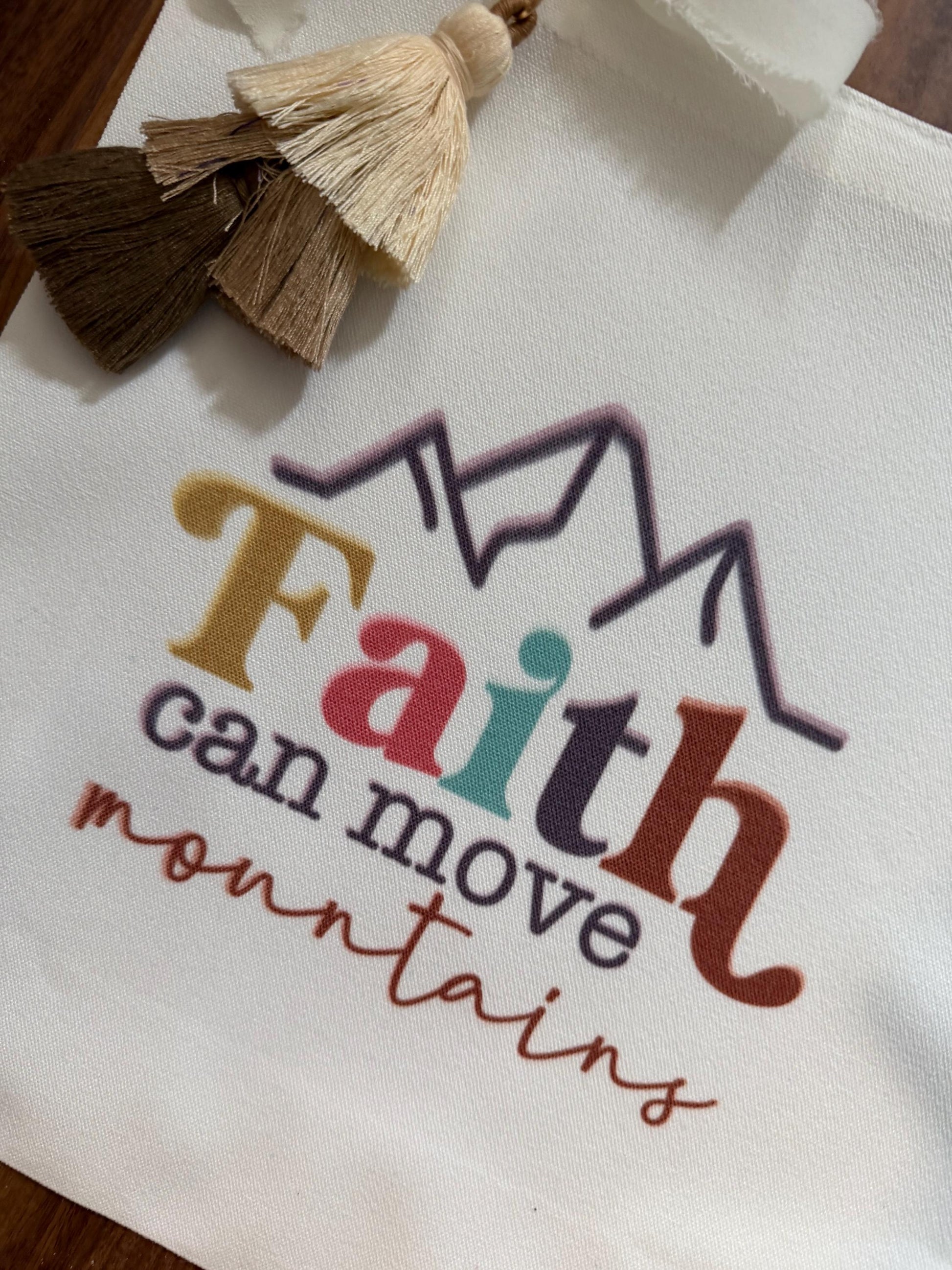 Faith tassel tote bag with vibrant mountain design, canvas Bible verse bag