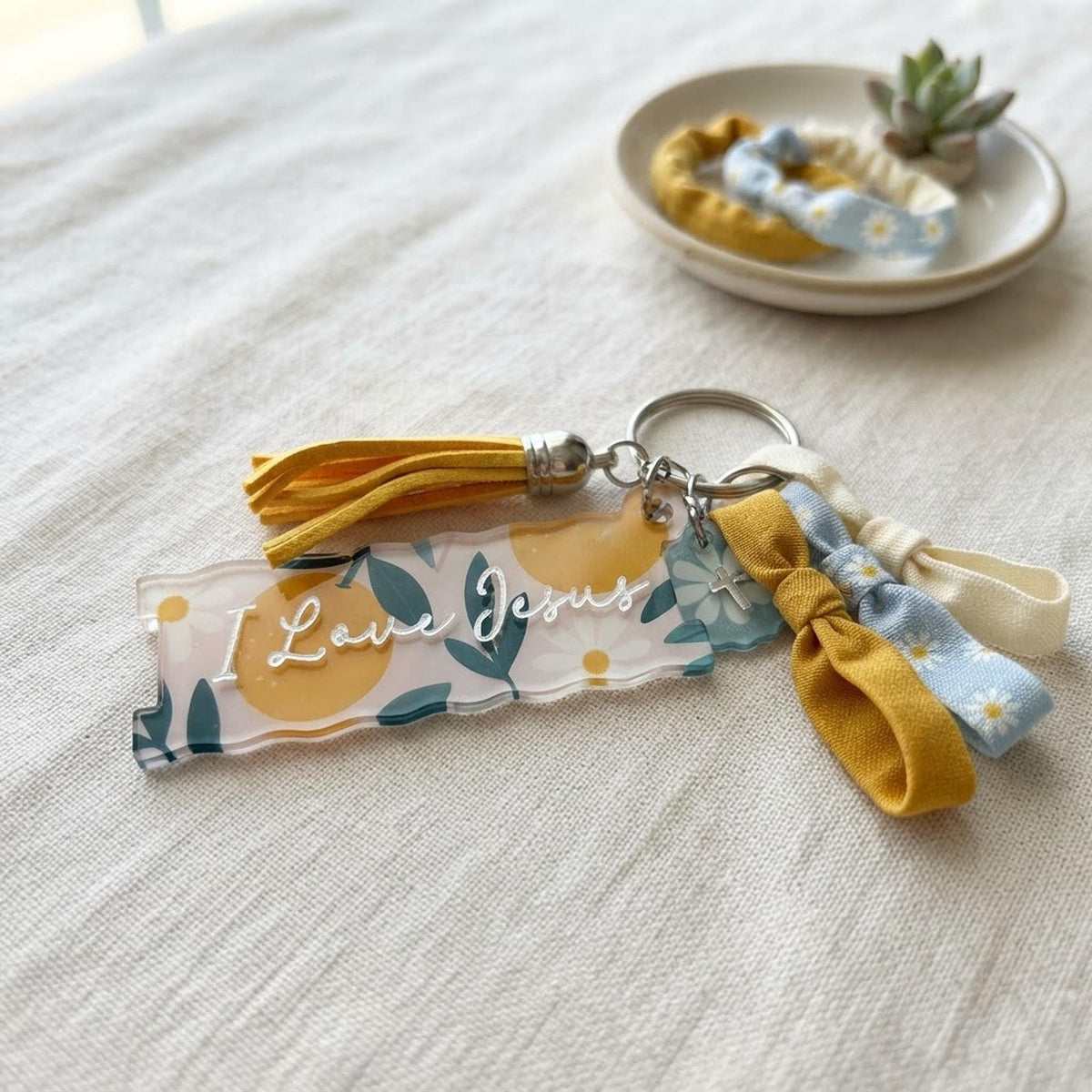 Retro fruit hair tie holder keychain | I Love Jesus Christian accessories | Ponytail holder, bag tag, hair tie organizer shown in a professional product listing photo