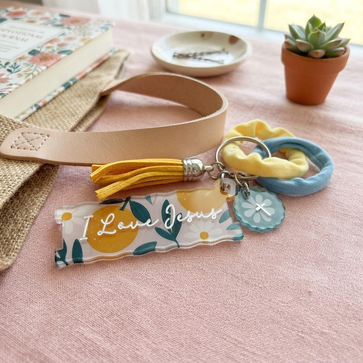 Retro fruit hair tie holder keychain | I Love Jesus Christian accessories | Ponytail holder, bag tag, hair tie organizer shown in a professional product listing photo