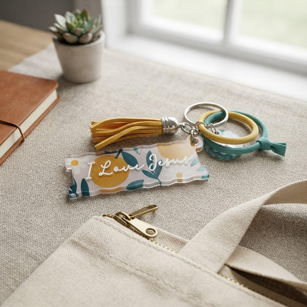 Retro fruit hair tie holder keychain | I Love Jesus Christian accessories | Ponytail holder, bag tag, hair tie organizer shown in a professional product listing photo