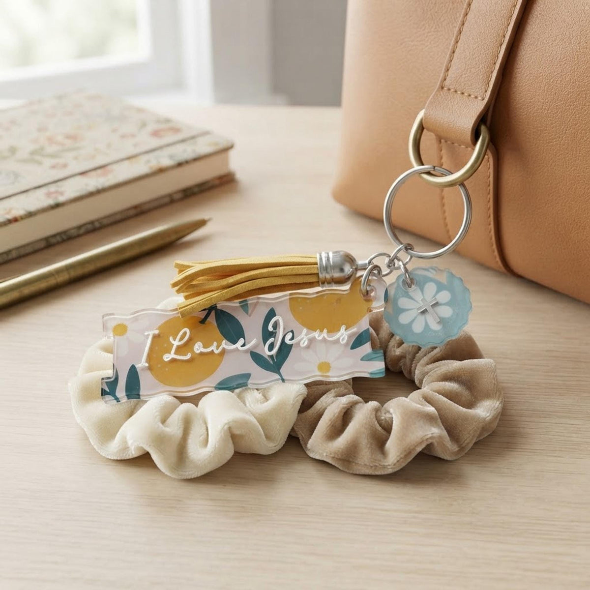 Retro fruit hair tie holder keychain | I Love Jesus Christian accessories | Ponytail holder, bag tag, hair tie organizer shown in a professional product listing photo