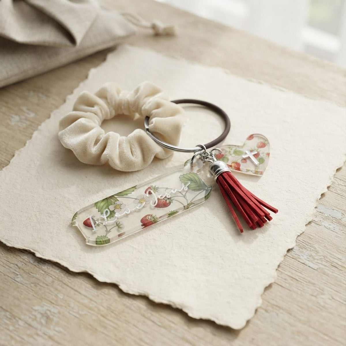 Vintage fruit hair tie holder keychain, Christian accessories, ponytail holder bag tag, I love Jesus, handmade gift, cute religious keychain shown in a professional product listing photo