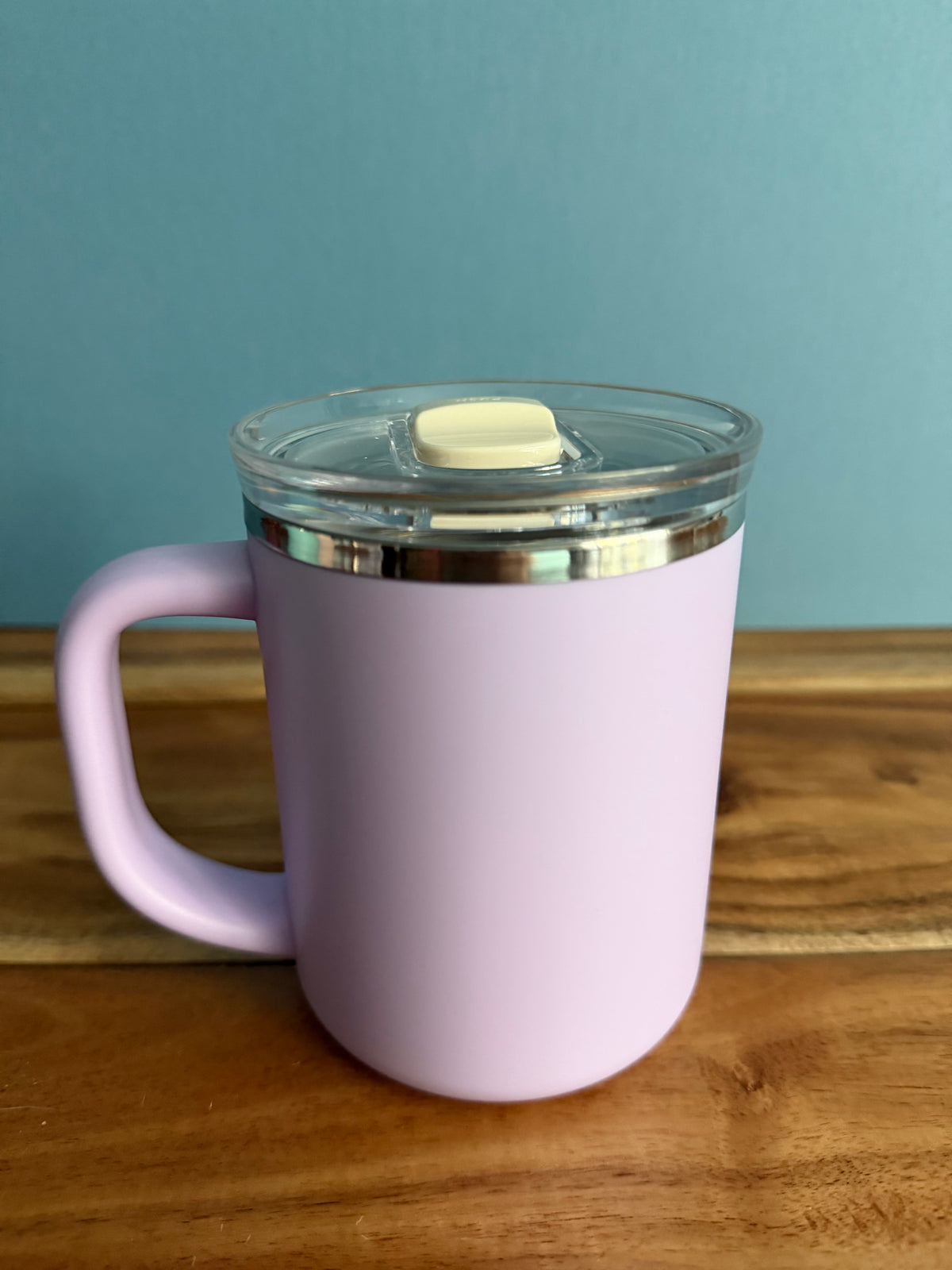 Sons & Daughters insulated mug in a simple library product image setup